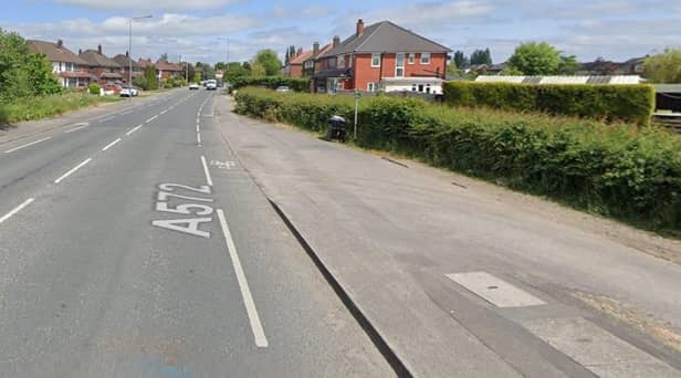 St Helens Road in Leigh has been closed by the police