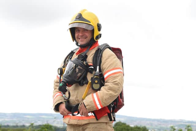 Charlie Thompson, is in training for the London Marathon in full kit, including breathing aparatus which weighs 20kg raising funds for Blood Cancer UK charity.
