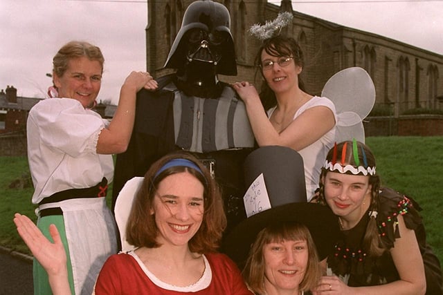 2000 - Staff and pupils at St. Catharine's School in Scholes, dressed as there favourite book characters for Book Day.  Pictured are members of staff with Darth Vader from left' Karen Turner, Catherine Lightley, Alice Hitchmough, Christine Crabtree and Alison Baxendale.  The school raised £127 for the Mozambique Appeal.