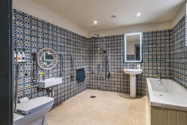 One of the spacious bathrooms guests can enjoy at The Globe Inn