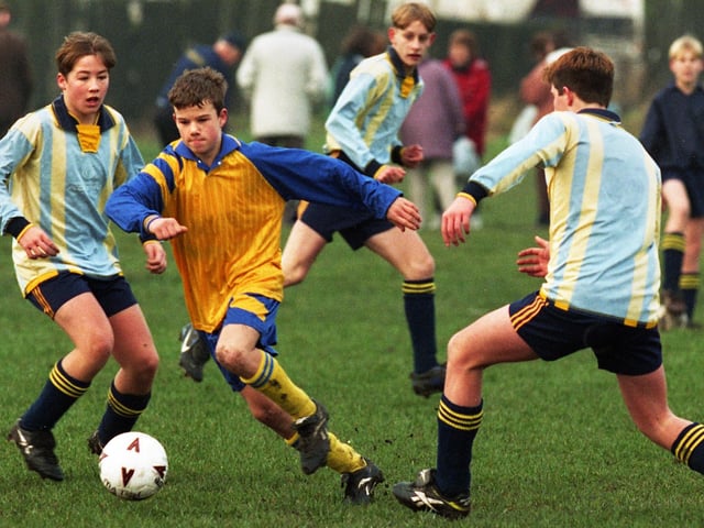 Action from the Under-15s clash between Hawkley and Falcons in a Wigan Youth League match at Little Lane on Sunday 21st of December 1997.
