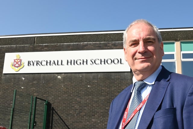 Headteacher Alan Birchall outside Byrchall High School, Ashton-in-Makerfield.