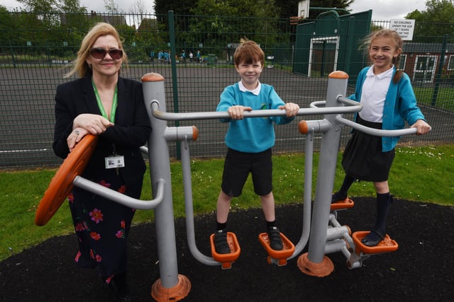 Staff and pupils enjoy the outdoor gym equipment.