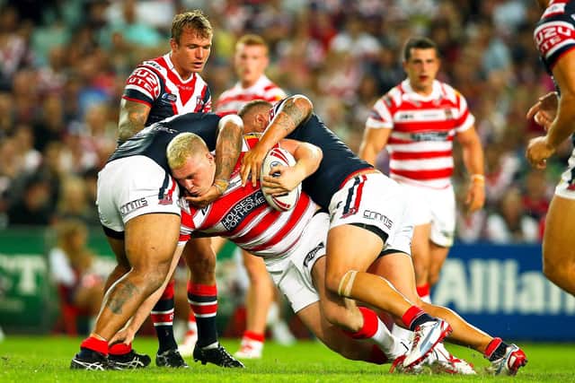 Scott Taylor in action against Sydney Roosters in 2014 during the World Club Challenge in Australia