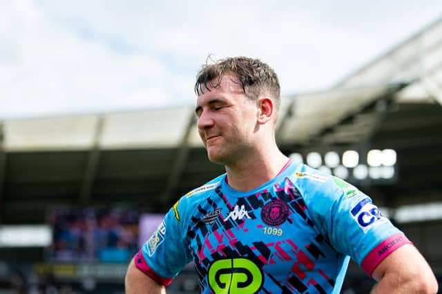 Picture by Allan McKenzie/SWpix.com - 20/07/2024 - Rugby League - Betfred Super League Round 18 - Hull FC v Wigan Warriors - MKM Stadium, Kingston upon Hull, England - Wigan's Harry Smith dejected after his side's loss to Hull FC. : Harry Smith