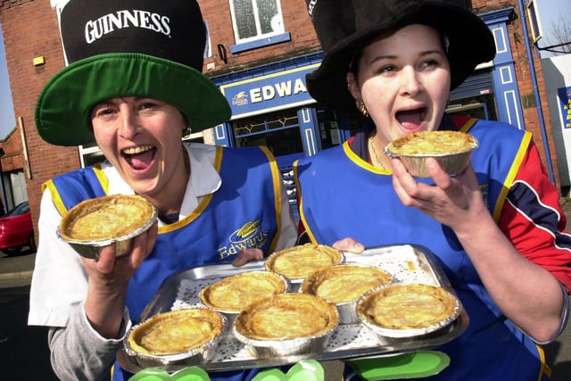 Edwards Bakery workers, Ann Unsworth and Teri Walford, sample Irish stew pies to celebrate St. Patrick's Day at the Platt Bridge shop on Monday 17th of March 2003.