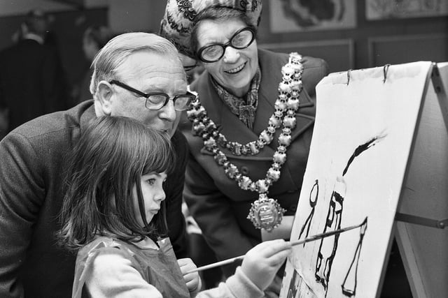 The Mayor of Wigan, Coun. Ethel Naylor, and Coun. Ernest Cowser with 6 year old pupil, Amanda Jane, at Winstanley Primary School after the official opening on Wednesday 22nd of November 1972.