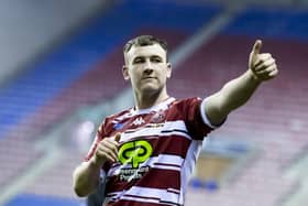 Wigan's Harry Smith thanks the fans for their support after victory over Huddersfield