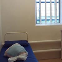 A Wigan stalker who terrified a woman with threatening messages has been sent to prison