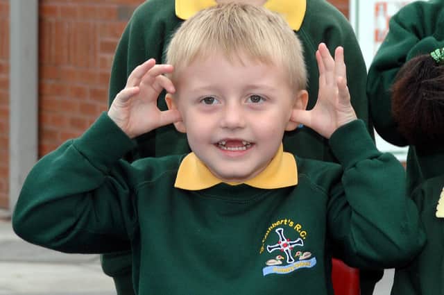 When lining pupils up for the photos or waiting for someone, to pass the time and keep the children interested our photographers would sometimes ask pupils and staff to make funny faces to the camera, these photographs would make the outtakes in the Wigan Observer supplement - here's a shot of a pupil from St Cuthbert's RC Primary, Norley Hall in 2009.