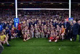 Wigan Warriors celebrate the Grand Final victory with the supporters