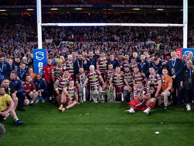 Wigan Warriors celebrate the Grand Final victory with the supporters