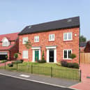 A street scene of Elan homes, similar to those at Garrett Hall Fields, including a five-bedroom Lincoln (centre)