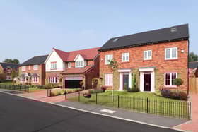 A street scene of Elan homes, similar to those at Garrett Hall Fields, including a five-bedroom Lincoln (centre)