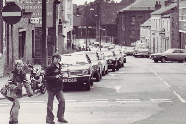 The Hallgate area of Wigan looking down towards the Bluecoats school and when there were still shops on this stretch in 1978.