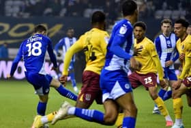 Jonny Smith scores Latics' second goal against Northampton in midweek