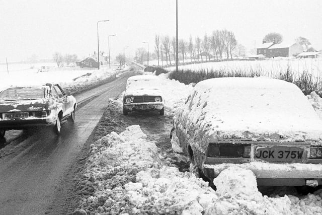 RETRO 1981 - Motorists in Standish drive in the snow in December 1981