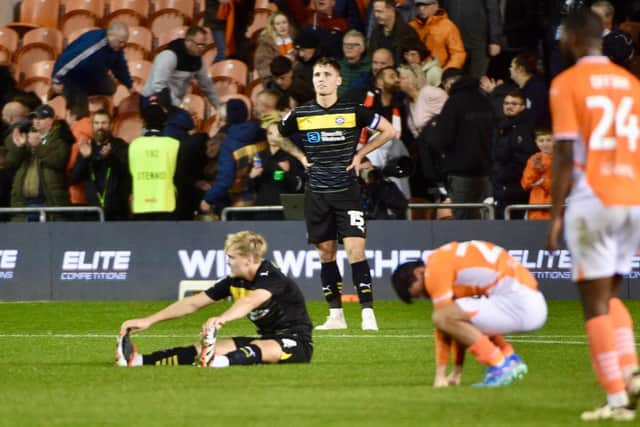 The Latics players are grounded after conceding a stoppage-time equaliser - and a second own goal - at Blackpool