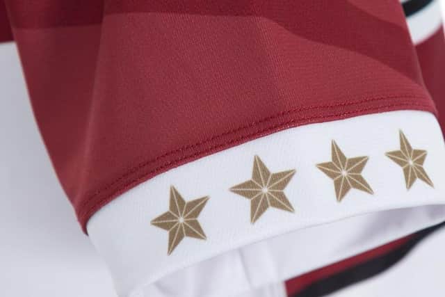 The four stars denoting the club’s World Club titles appear on the trim of the right sleeve