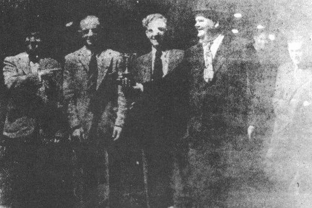 Laurel and Hardy made a personal appearance at Poolstock Greyhound Stadium during their 1947-48 Great Britain tour.  Pictured are Stan and Ollie with, left to right between them, Oliver and Ron Hart who owned Poolstock Greyhound and Speedway Track