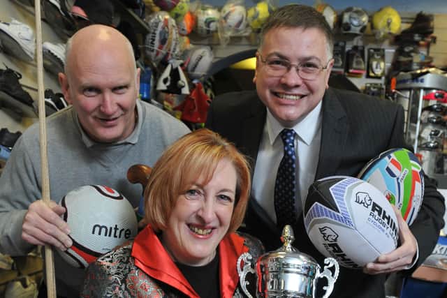 Yvonne Fovargue visiting Sportsline in Ashton onSmall Business Saturday six years ago. She is pictured with Ron Hart and Mark Ferguson, Branch Chair, Federation of Small Business