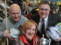 Yvonne Fovargue visiting Sportsline in Ashton onSmall Business Saturday six years ago. She is pictured with Ron Hart and Mark Ferguson, Branch Chair, Federation of Small Business