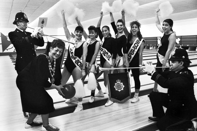 Wigan mayor, Coun. Audrey Bennett, launches the first bowling ball at the official opening of Wigan Superbowl on Thursday 22nd of February 1990.