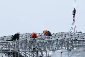 Scaffolding surrounding Haigh Hall is removed, part of the Haigh Hall project.