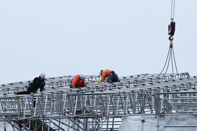 Scaffolding surrounding Haigh Hall is removed, part of the Haigh Hall project.