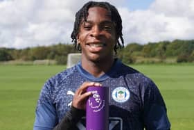 Martial Godo with the PL2 Player of the Month award for August