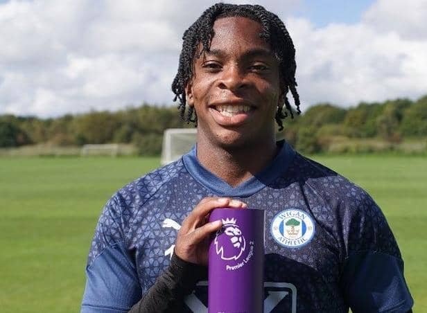 Martial Godo with the PL2 Player of the Month award for August