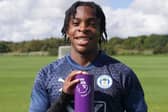 Martial Godo with the PL2 Player of the Month award for August