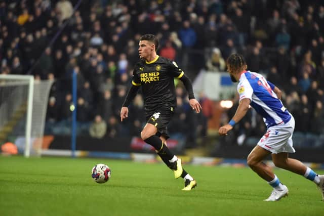 Omar Rekik enjoyed an encouraging debut for Latics at Blackburn before limping off through injury