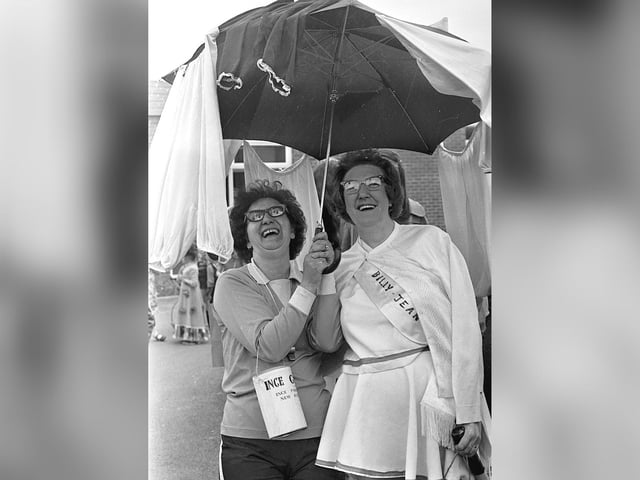 Keeping dry at the 1975 May Day walk at Stubshaw Cross