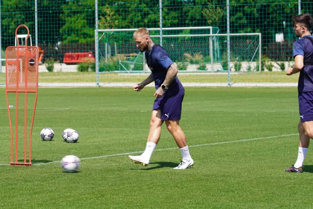 Stephen Humphrys working hard on the training ground in Budapest