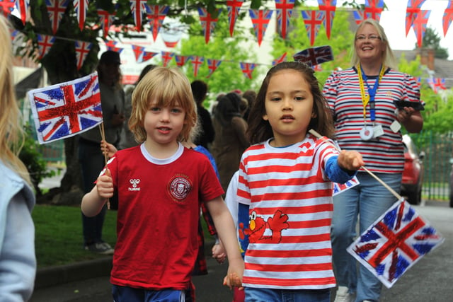 Staff and pupils at Mab's Cross primary school, Wigan, parade around the school, part of celebrations for the Queen's platinum jubilee.