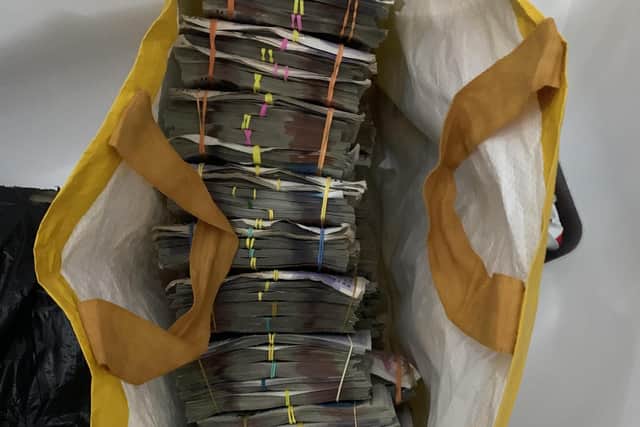 Sean Doyle stashed cash in a bag for life and threw this out of his bathroom window onto the roof. This was quickly recovered by officers and amounted to over £365,000.