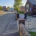 The polling station sign being put up at St Francis's Church, Kitt Green, before the general election polls opened this morning (July 4)
