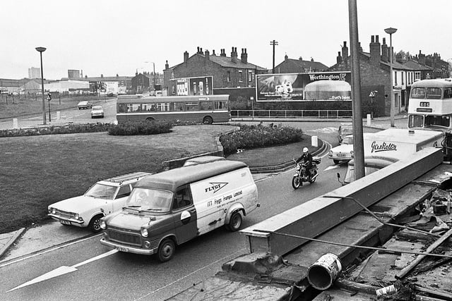 The Saddle junction in the early 1970s with Ormskirk Road on the right and Warrington Road on the left with the Worsley Mesnes flats in the background.