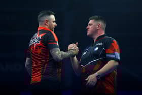 Joe Cullen defeated Daryl Gurney for a place in the quarter-finals of the World Grand Prix darts at Mattioli Arena