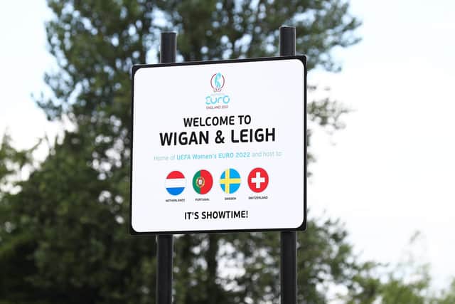 WIGAN AND LEIGH - JUNE 27: UEFA Women's EURO England takes over Wigan and Leigh Welcome Sign to welcome the Netherlands, Portugal, Sweden and Switzerland national team's heading there ahead of the tournament kicking off on 6 July on June 27, 2022 in Wigan and Leigh, England.  (Photo by George Wood/Getty Images)
