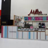 The empty Millie's Cookies kiosk
