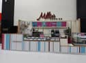 The empty Millie's Cookies kiosk
