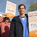 Junior doctor Joe Harris on the picket line outside Wigan Infirmary earlier this year