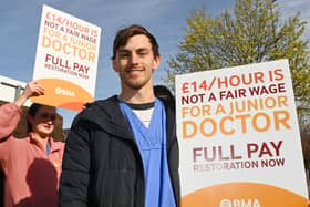 Junior doctor Joe Harris on the picket line outside Wigan Infirmary earlier this year