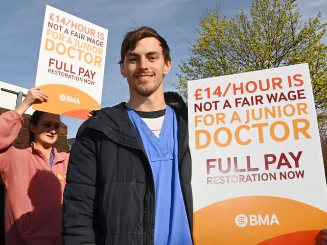 Junior doctor Joe Harris on the picket line outside Wigan Infirmary earlier this year