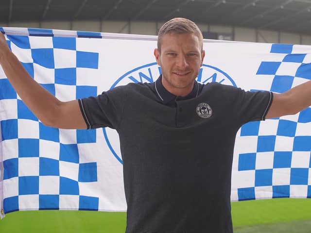 Paul Mullin gets used to his new surroundings at the Brick Community Stadium