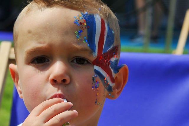 Arlo Leigh, three, gets into the spirit of the event,