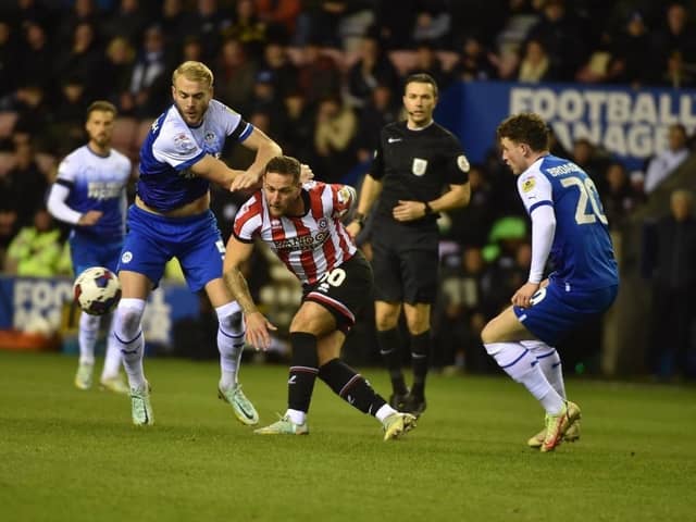 Jack Whatmough was forced off during the first half of Monday night's 2-1 home defeat to Sheffield United