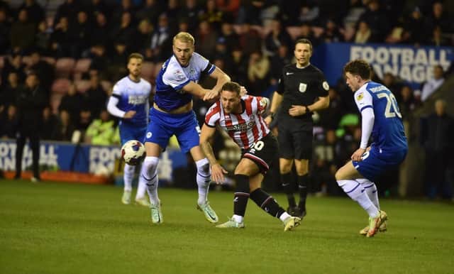 Jack Whatmough was forced off during the first half of Monday night's 2-1 home defeat to Sheffield United